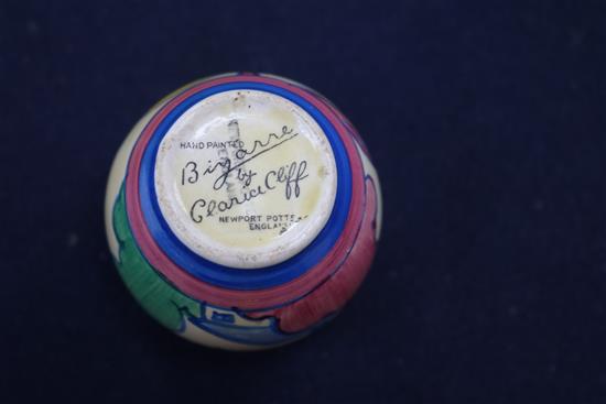 A Clarice Cliff Bizarre miniature vase and an Ault vase